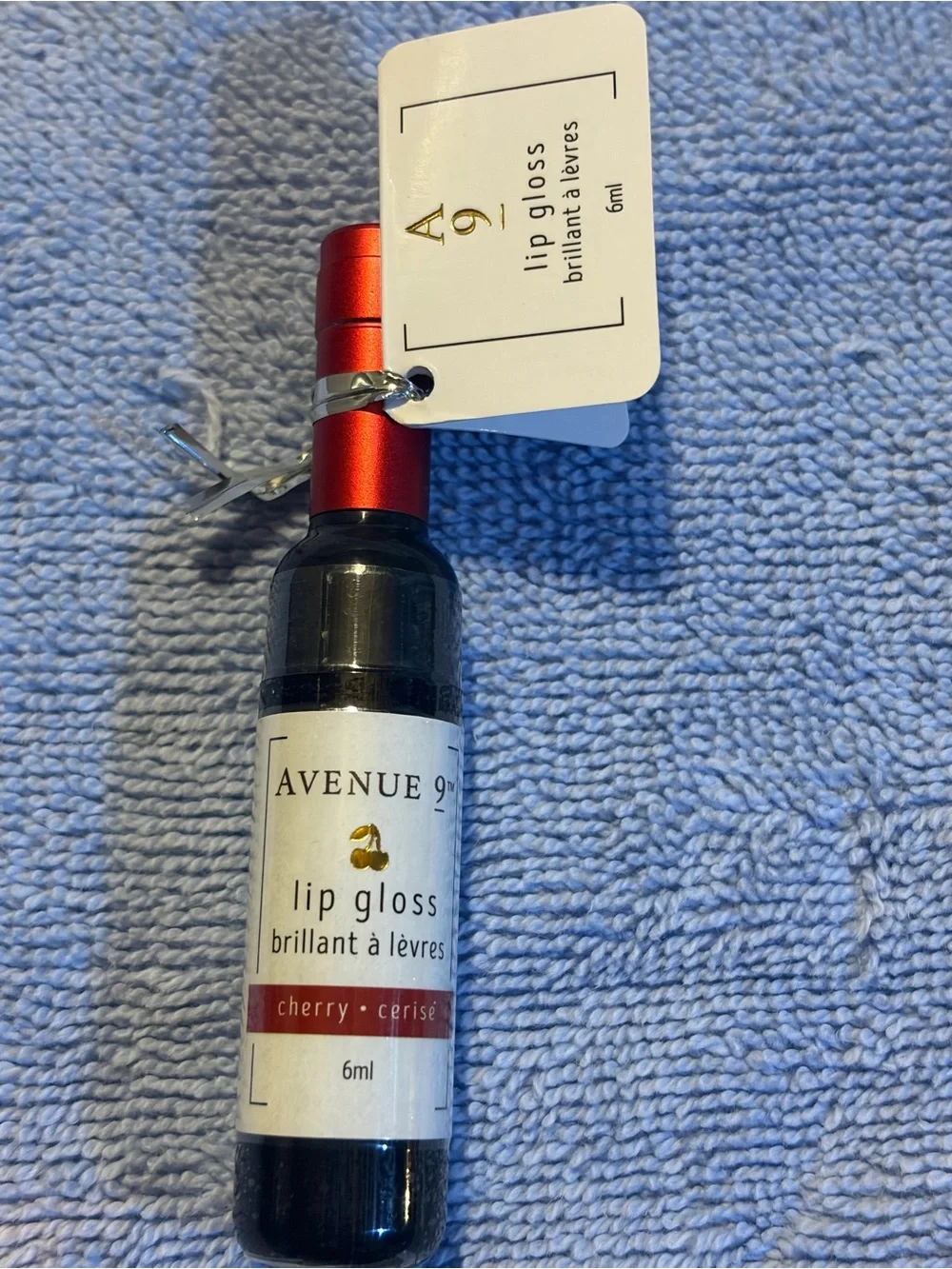 Avenue 9 Cherry Wine Bottle Lip Gloss, new/unopened. Exp 12/2027